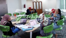 Para wanita yang sedang sibuk mengurusi pekerjaanya (Ulfah Choirun Nissa/Suaka)